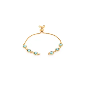 Detail of 18K gold-plated friendship bracelet with six light blue round gemstones and sliding clasp