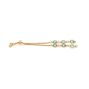 Detail of 18K gold plated friendship bracelet with blue gemstones and adjustable slider