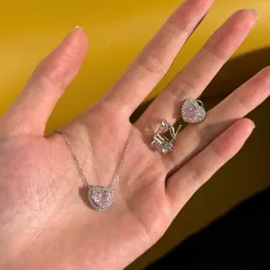 Elegant S925 silver set with pink heart-shaped stones including a necklace and earrings