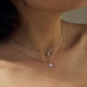 Minimalist S925 silver necklace with sparkling round zircon pendant in gold and silver
