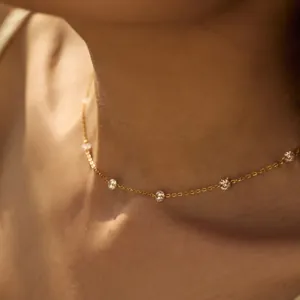 Minimalist S925 silver gold-plated necklace with six round cubic zirconia pendants