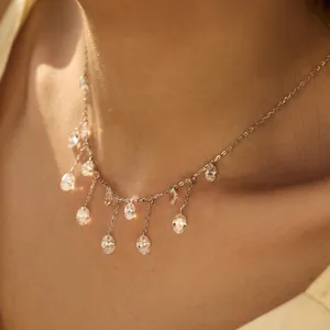Elegant S925 silver fringe necklace featuring oval cubic zirconia pendant drops