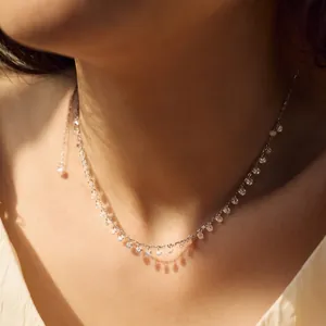 S925 silver necklace with sparkling 3mm zircon pendants on model collarbone