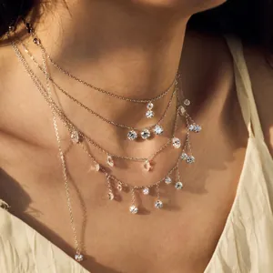 Elegant S925 silver layered necklace with round and teardrop cubic zirconia pendants