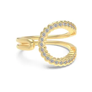 Golden double-layered open ring with sparkling pavé-set circular white zircon crystals