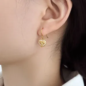 S925 sterling silver heart drop earrings with gold finish and sparkling crystal accents
