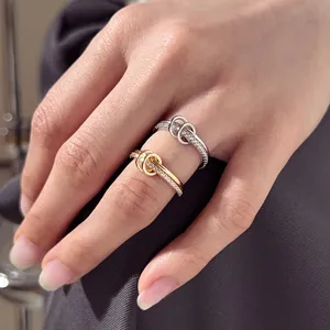 S925 sterling silver interlocking rings set with white zircon in gold and silver finish