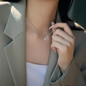 Detailed close-up of S925 silver necklace with marquise and round cubic zirconia pendant