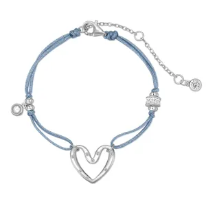 Bracciale intrecciato celeste in argento S925 con ciondolo a cuore in cristallo lucido