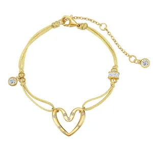 Bracelet tressé délicat en argent S925 avec pendentif coeur évidé serti de zircon