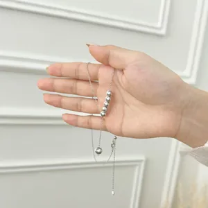 Minimalist S925 silver necklace with cat-eye beads and long elegant pendant chain