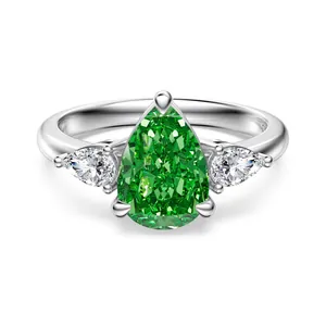 Elegant S925 silver ring with a pear-cut green gemstone and two white side stones