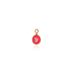 Detail view of 18K gold plated strawberry mushroom pendant with red enamel heart detail
