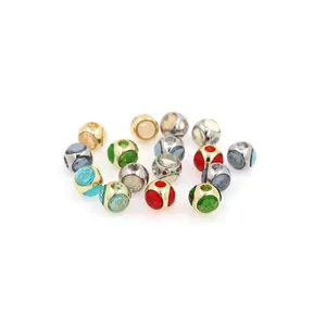 Detailed view of 18K gold plated zircon beads in multiple colors for DIY jewelry