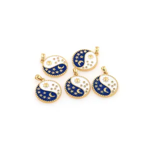 Detailed view of 18K gold plated Yin Yang pendants with celestial moon and star zircon accents