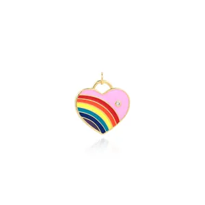Macro shot of an 18K gold-plated rainbow heart pendant with micro-set zircon