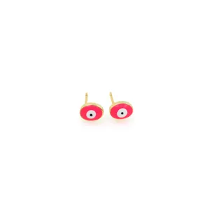 Detail of pink evil eye stud earrings in 18K gold plated finish with enamel texture