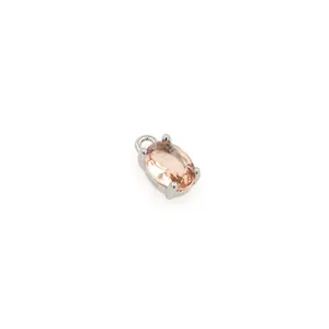 Detailed view of 18K gold-plated oval pendant with champagne zircon in a four-prong setting