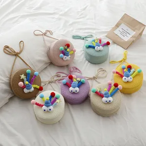 Bolso Bandolera para Niñas con Diseño de Monstruo de Ojos Grandes de Paja Tejida Mini Monedero Redondo con Adorno de Bola de Pelo