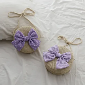 Borse a tracolla tonde in paglia per bambini con fiocchi decorativi floreali viola