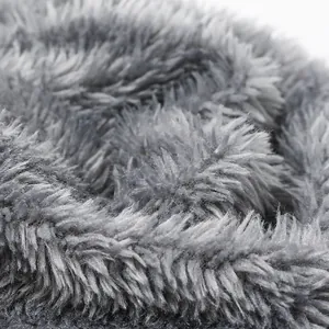 Close-up of thick grey faux fur lining showing soft texture and high-density warm fabric