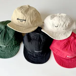Assorted colors of kids soft cotton baseball caps with Discover embroidery detail