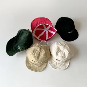 Detailed view of assorted soft cotton baseball caps with Discover embroidery and wind cords