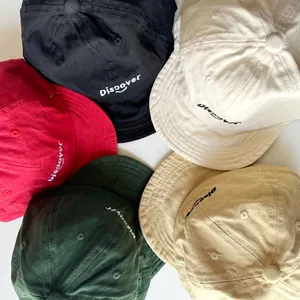 Five assorted colors of soft-brim kids baseball caps with embroidered Discover smiley face