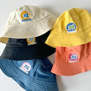 Kids vintage bucket hats with 74 Holiday print in five vibrant assorted colors