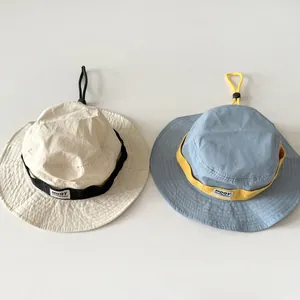 Detail of adjustable chin straps and lightweight quick-dry fabric on outdoor sun hats