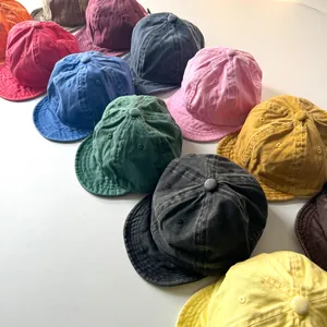 Variety of vintage washed cotton baseball caps for babies with soft brims in multiple colors