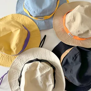 Kids quick-dry outdoor bucket hats with wide brims in multiple colors and sun protection