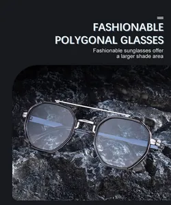 Macro detail of fashionable polygon sunglasses with double bridge and metal frame on rock