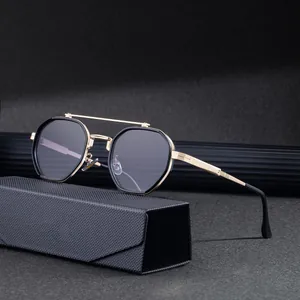 Retro polygon sunglasses in black and gold with a double bridge and carbon fiber case