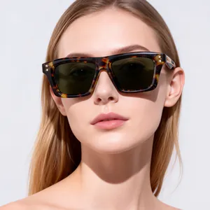 Front view of model wearing trendy square tortoiseshell sunglasses with dark lenses