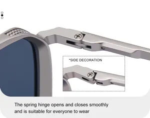 Detailed view of the spring hinge on silver square sunglasses for smooth opening