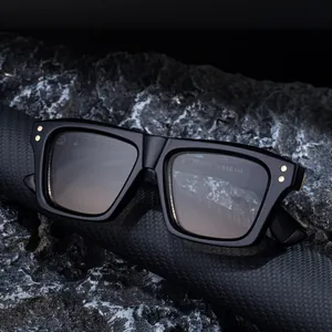 Classic square polarized sunglasses for men with black frame and golden rivet details