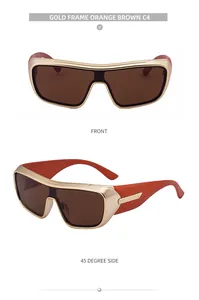Detail view of gold frame sports sunglasses with orange brown lenses and metal finish