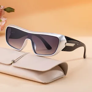 Modern sports sunglasses with silver frame and purple gradient lenses including a beige pouch
