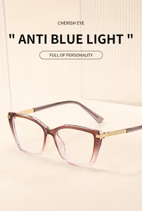 Detailed close-up of cat-eye glasses with gradient frames and blue light blocking lens