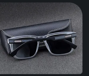 Detail of square polarized sunglasses with textured black faux leather storage case