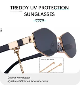 Detail of hexagonal sunglasses with gold chain and UV protection metal frames