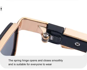 Detail of premium spring hinge on gold metal sunglasses arm for durable smooth movement