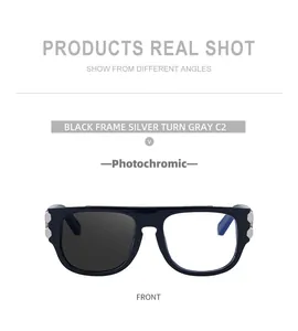 Detail of square photochromic sunglasses with black frame and silver hexagonal rivets