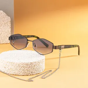 Chic hexagonal sunglasses with grey gradient lenses, green marble arms and metal chain