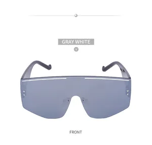 Front view of shield sunglasses with gray white lenses and silver rivet accents