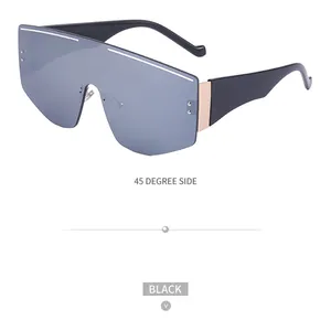 Detailed 45-degree side view of oversized black shield sunglasses with silver rivets