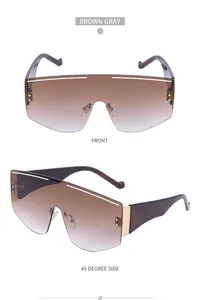 Close-up of brown gray shield sunglasses with gradient lenses and metal nose pads