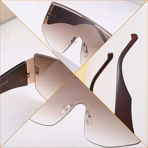 Frameless oversized cycling sunglasses with gradient brown lenses and wide temples