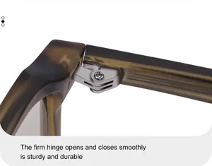 Close-up of the durable silver metal hinge and brown resin frame of these sunglasses